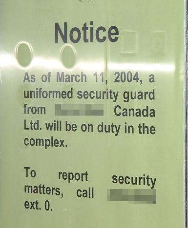 A sign announcing that a security guard will be present beginning that night